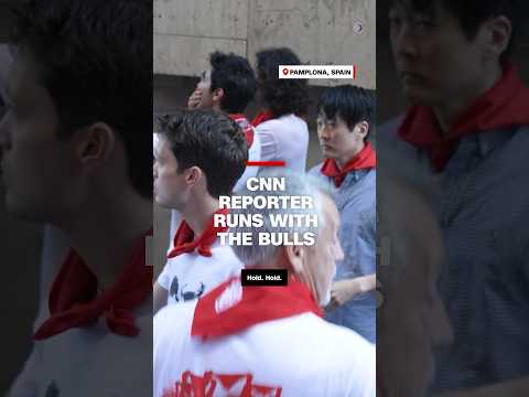 CNN reporter runs with bulls